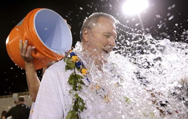 Punahou coach David Trifonovitch was doused with water after yet another state title. Jamm Aquino / Star-Advertiser