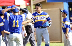 Kaiser's Lincoln Lima celebrated with his teammates after his game-tying home run against Kalani last Wednesday. Photo by Bruce Asato/Star-Advertiser.