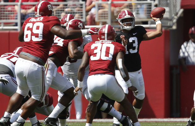 Alabama quarterback Tua Tagovailoa attempted a pass behind his offensive line during the Crimson Tide's annual A Day spring game. Associated Press photo. 