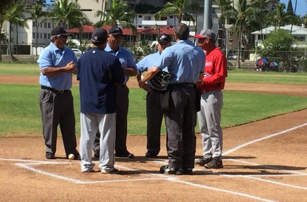 Kamehameha coach Thomas Perkins and Saint Louis coach George Gusman will meet at home plate on Monday for the seventh different time this season. Photo by Paul Honda/Star-Advertiser.