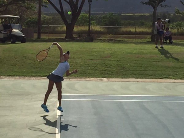 Taylor Lau of St. Francis served against Katreina Corpuz of Punahou during the ILH girls championship on Wednesday. (Apr. 19, 2017) Paul Honda/Star-Advertiser