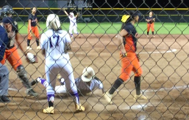 Jaeda McFarland slid home with the game's only run in the bottom of the ninth inning to give Pearl City a 1-0 win over Campbell in the OIA softball semifinals on Monday. Photo by Paul Honda/Star-Advertiser