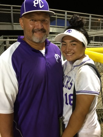 Pearl City assistant coach Roland Kaaialii and pitcher Tyanna "Peanut Butter" Kaaialii. (Apr. 24, 2017) Paul Honda/Star-Advertiser