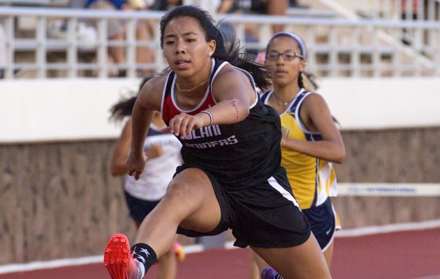 'Iolani's Nikki Shimao finished the girls 300 meter hurdles in 46.62 seconds to win the ILH title. Photo by Cindy Ellen Russell/Star-Advertiser.