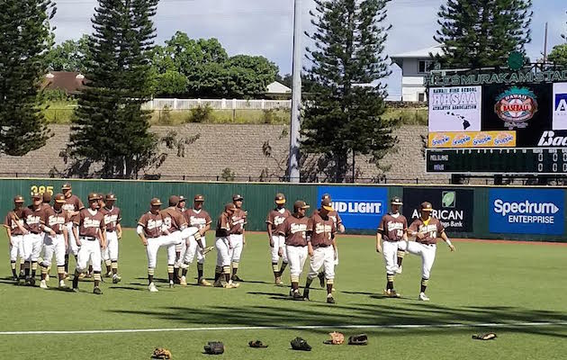 Mililani begins warmups in advance of its first-round state tournament game against Maui. Photo by Billy Hull/Star-Advertiser.