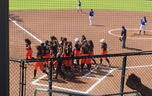 This was the result of Kealakehe pitching to Campbell's Jocelyn Alo in the first inning. A meeting of Sabers at home plate to greet Alo after she blasted a solo homer. Photo by Paul Honda/Star-Advertiser.