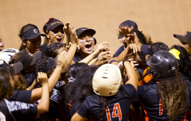 The Campbell Sabers celebrated after beating top-seeded Mililani 2-0 in the championship game of the state softball tournament on Saturday night at Rainbow Wahine Softball Stadium. Photo by  Dennis Oda/Star-Advertiser
