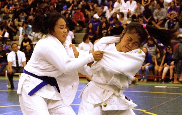 Macy Higa, left, will have to negotiate a tough bracket to win her second state judo title. Dennis Oda / Star-Advertiser