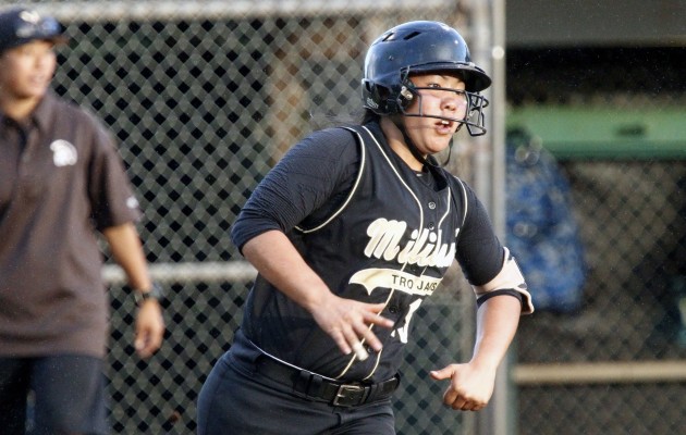 Mililani's Maya Yoshiura rounded first base after hitting an RBI double during the Trojans' four-run third inning against Maui. Photo by Jamm Aquino/Star-Advertiser.