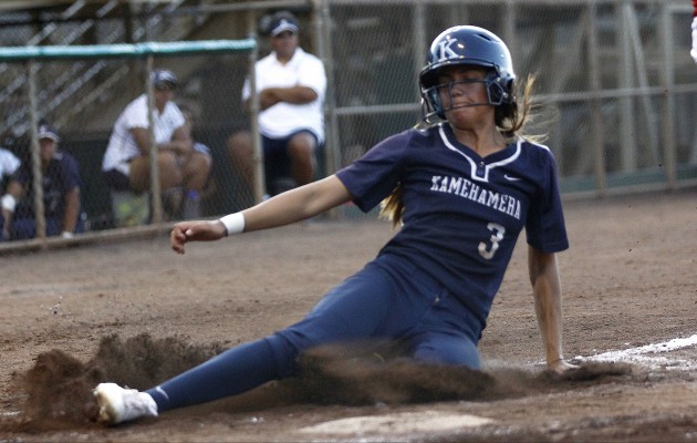 Kamehameha senior Alana Cobb-Adams slid across home plate safely for one of the two Kamehameha runs in a tight win over Roosevelt in the first round of the softball state tournament. Photo by Jamm Aquino/Star-Advertiser.