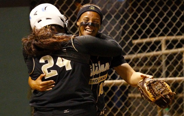 Mililani's Shannon Pascua-Stanton (24) and Merilis Rivera both hit two-run homers in the second inning of the Trojans' 14-4 win over Kamehameha on Friday. Photo by Jamm Aquino/Star-Advertiser
