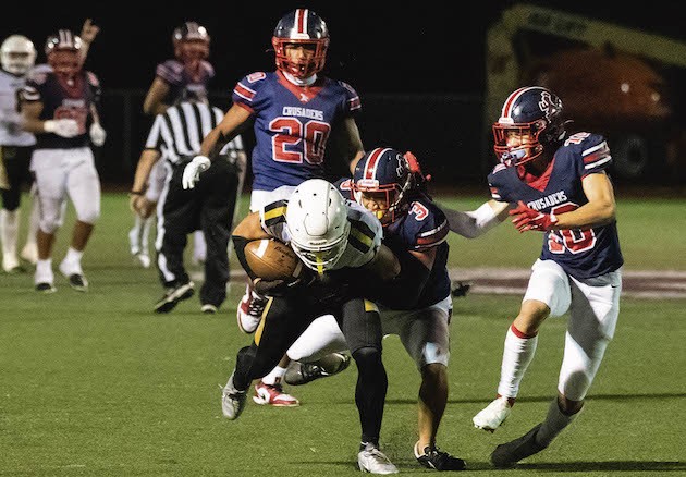 Saint Louis swats away Mililani's final pass to set up state title